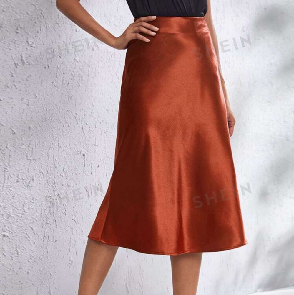 Midi length satin skirt